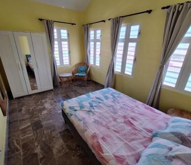 Tera Kora Apartamento | Water Villa's Bonaire - Porch with view on the canal