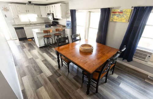 Spring Grove Cabaña | Waterfront 2BR Nautical Cottage on Grass Lake - Hot Tub, Firepit & Year-Round Fun