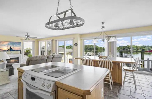 Cobb Island Cabaña | Waterfront 4-bedroom home with hot tub and gym!