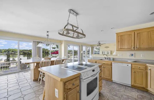 Cobb Island Cabaña | Waterfront 4-bedroom home with hot tub and gym!