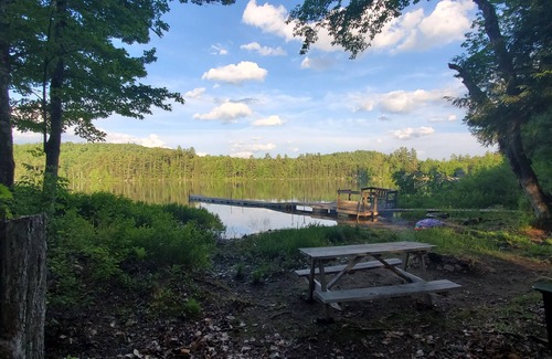 Bryant Pond Cabina | Waterfront and Mountain view a HOT TUB, Unlimited KARAOKE and Pet Friendly!