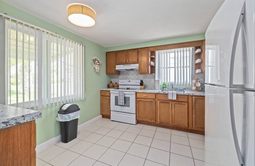 Green Key Estates Casa | Waterfront Angler’s Paradise, 3BR/2.5BA w/ Dock, Boat Ramp, Kayaks, HorseShoes, CornHole, Ping Pong