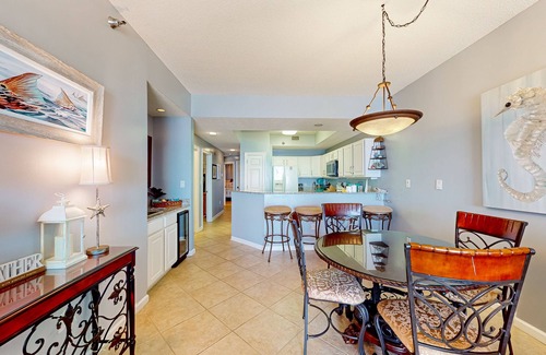 Orange Beach Condominio | ¡NUEVO LISTADO! Condominio frente al mar con piscina compartida, tenis y sauna - cerca de la playa