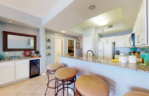 Orange Beach Condominio | ¡NUEVO LISTADO! Condominio frente al mar con piscina compartida, tenis y sauna - cerca de la playa