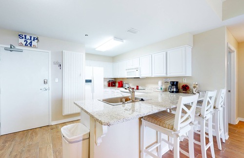 Fort Morgan Pines Condominio | Waterfront condo with bay views, pool, hot tub, boat ramp, & private balcony
