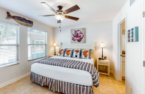 Harbor Oaks Casa | Waterfront condo with balcony, private boat slip, fishing pier, pools, & tennis