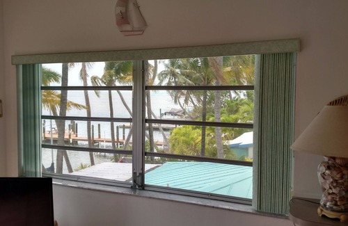 Marathon Cabaña | Frente a la bahía Conch Key Cottages Con Velero incluido