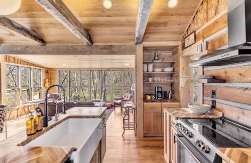 Nunnelly Cabina | Waterfront Designer Cabin w/ Dock, Decks, Hot tub and Fire Pits.