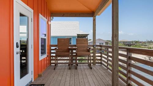 Flour Bluff Casa | Waterfront Escape w Views Shared Pool Boat Dock Orange Crush by AvantStay