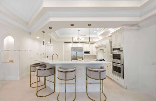 Eastern Shores Casa | Waterfront gated pool mansion.