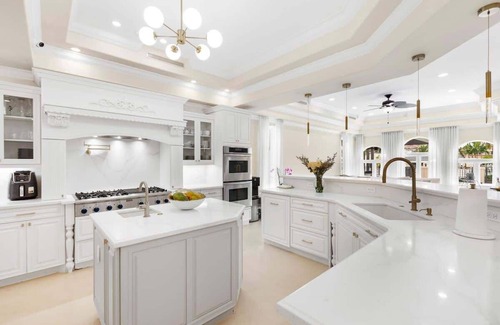 Eastern Shores Casa | Waterfront gated pool mansion.