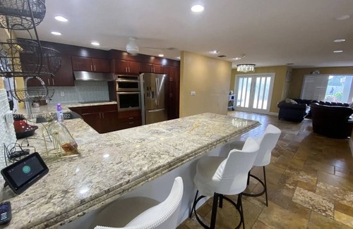Garden Isles Casa | Waterfront, heated Pool enclosed, our home is completely renovated, very private