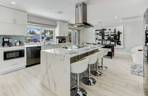 Coral Ridge Isles Casa | Waterfront home: Boat dock, Private Pool, Near Beach