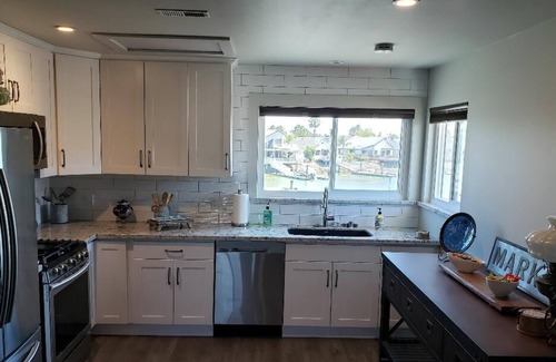 Discovery Bay Casa | Waterfront Home with large boat dock & boat rental and other water toys