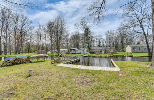 Gladwin Casa | Waterfront Home with Boat Slips in Northern Michigan