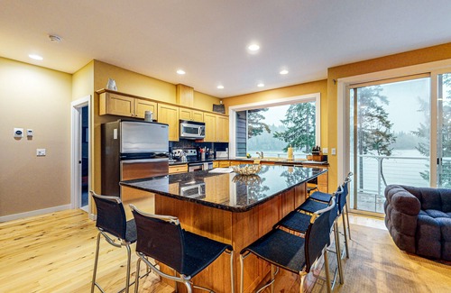 Shelton Casa | Waterfront home with private hot tub, patio, games, & gym room