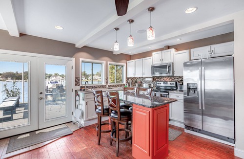 Edgewater Casa | Waterfront home with spacious deck, dock, washer/dryer & central AC