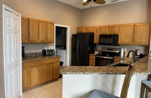 Palm City Casa | Waterfront house with dock, lift and hot tub