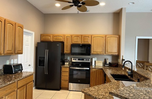 Palm City Casa | Waterfront house with dock, lift and hot tub