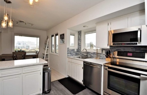 East Quogue Casa | ¡NUEVO EN EL MERCADO! Waterfront Hamptons Vacation Retreat con muelle