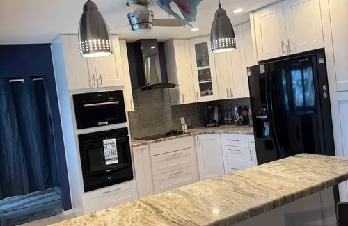 Palm Harbor Casa | Waterfront Lake Tarpon Home with heated salt water pool, fitness room, WiFi