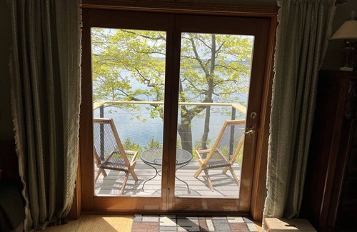 Town of Ledyard Casa | Waterfront retreat on 7 private wooded acres with beautiful sunset views.