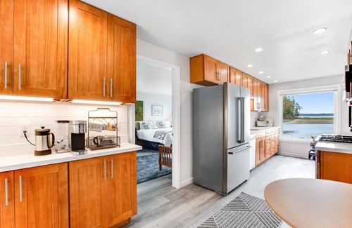 Lakebay Casa | Waterfront retreat with private beach, cookhouse, hot tub, EV charger, & firepit