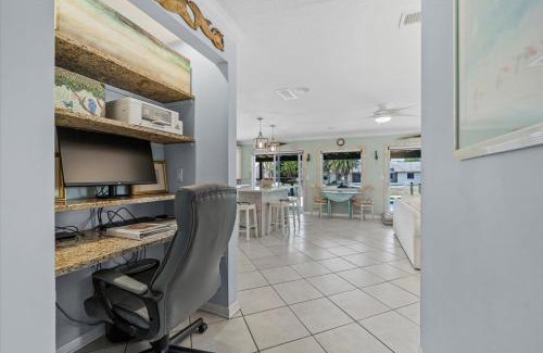 Palm Harbor Casa | Waterfront Retreat with Pool Tiki Bar & Boat Dock