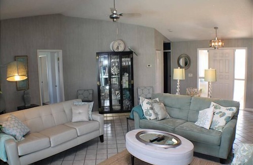 Palm Harbor Casa | Waterfront vacation home with solar heated pool by Redawning