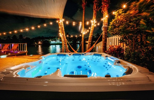 Pembroke Pines Villa | Waterfront Villa w/ Pool Game Room Cinema Spa