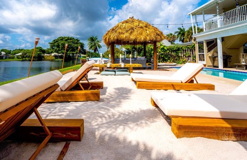 Florida North Atlantic Coast Villa | Waterfront w/ Beach Htd Pool Cinema Game Room Tiki