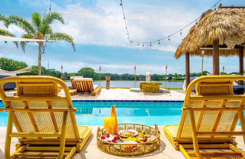 Florida North Atlantic Coast Villa | Waterfront w/ Beach Htd Pool Cinema Game Room Tiki