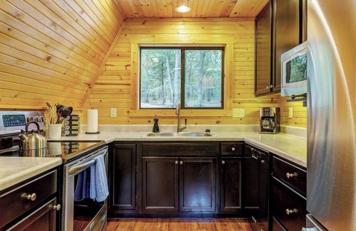 Wright City Cabaña | Waterside Cottage w/ Hot Tub by StayLage