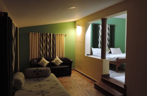 Kolagappara Cama Y Desayuno | Wayanad Stay es un hogar familiar.