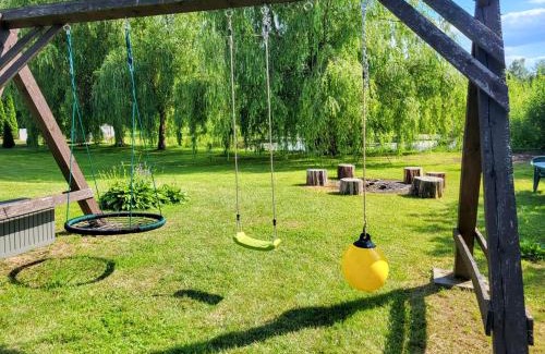 Elk Casa | WczasyMazurskie - Domek całoroczny Piwonia Mazury z prywatną plażą