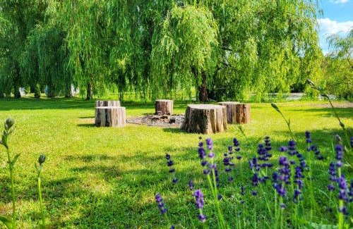 Elk Casa | WczasyMazurskie - Domek całoroczny Piwonia Mazury z prywatną plażą
