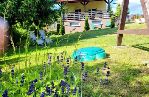 Elk Casa | WczasyMazurskie - Domek całoroczny Piwonia Mazury z prywatną plażą