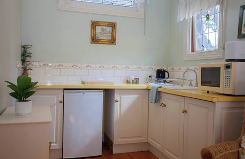 Golden Point Casa | Welcome to Rapunzel's Cottage, a charming 1-bedroom studio with a magical fairytale vibe