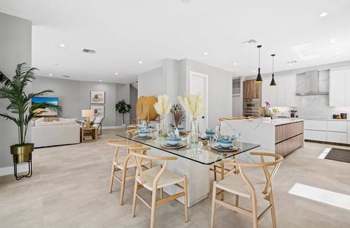 Middle River Terrace Casa | WELCOME TO THE RIVERHOUSE, A STUNNING MODERN HEATED POOL HOME ON WATERWAY!!!