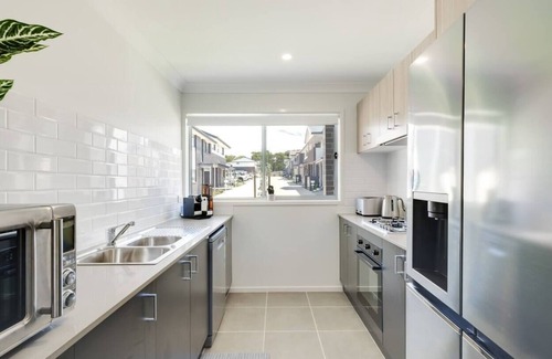 Charmhaven Casa | Welcome to your brand new stunning townhouse located in the Central Coast!