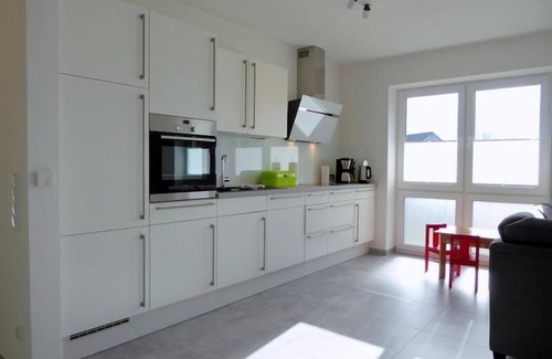 Dangast Apartamento | Este espacioso apartamento en la planta baja, sin barreras, en un hermoso sur frente a mendigar