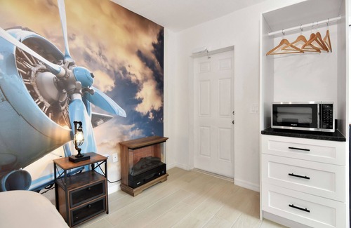 Daytona Beach Shores Hotel | Daytona Studio suite Queen bed kitchen walk in shower #3