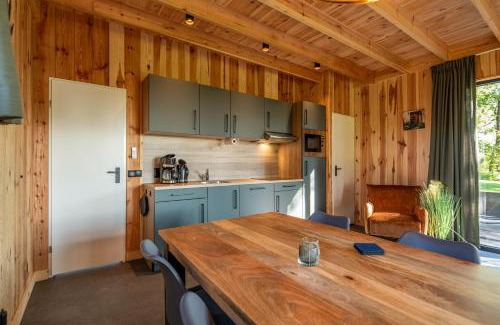 Stieltjeskanaal Apartamento | Wellnesslodge Scholekster met jacuzzi en uitzicht