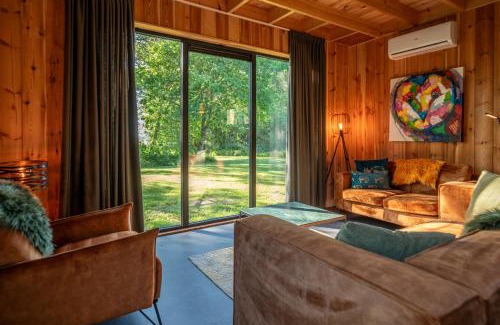 Stieltjeskanaal Apartamento | Wellnesslodge Scholekster met jacuzzi en uitzicht