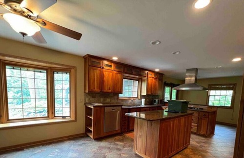 Dane County Casa | Where cabin coziness meets near-city living convenience.