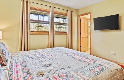 Dane County Casa | Where cabin coziness meets near-city living convenience.
