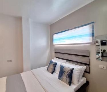 Manoc-Manoc Apartamento | White Beachfront Apartment By Anna