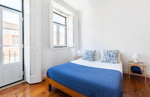 Alfama Apartamento | White & Blue Vintage Home in Graça