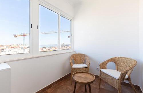 Alfama Apartamento | White & Blue Vintage Home in Graça