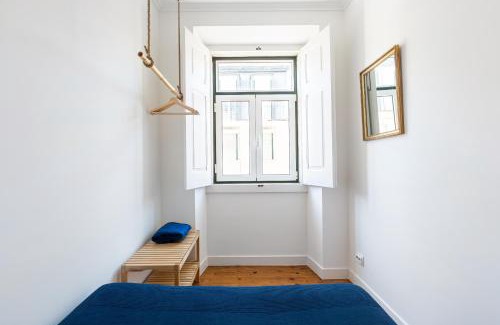 Alfama Apartamento | White & Blue Vintage Home in Graça